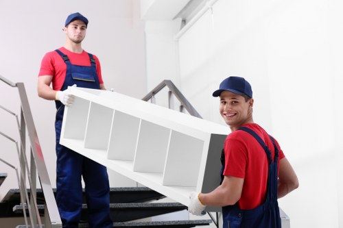 West Kensington moving team loading furniture carefully into a van