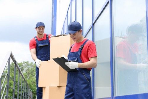 Careful handling of boxes and household items during a flat move