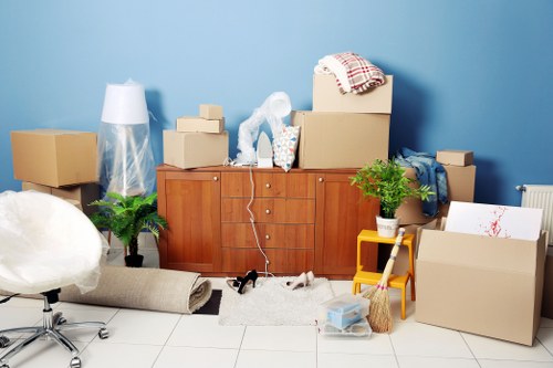 Team loading furniture safely into a van
