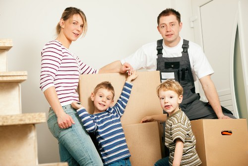 Moving crew loading household items for a West Kensington relocation