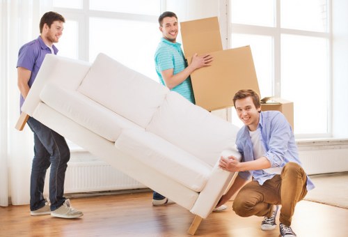 Preparation checklist and packed belongings for a West Kensington house move