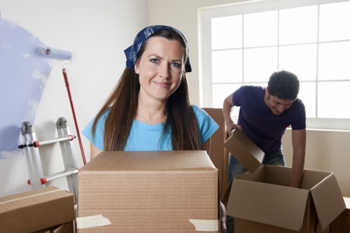 Worker securing items inside a moving van