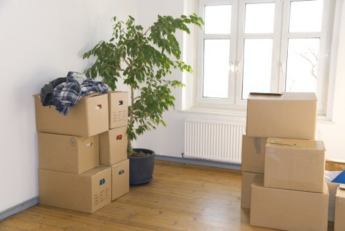 Furniture and household items prepared for transport in West Kensington
