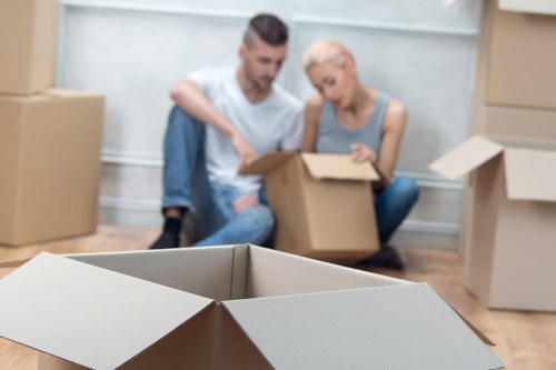 Removal van loading furniture and household items with care