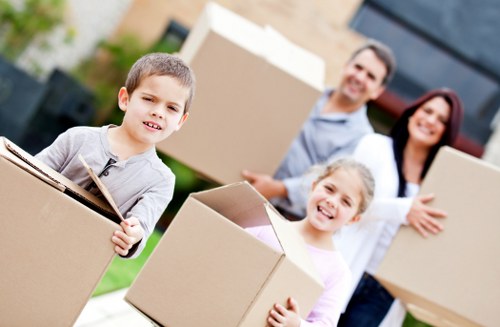 Packed household items in sturdy cartons ready for collection in West Kensington