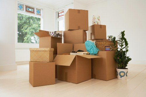 Unpacking boxes and organising rooms in a West Kensington property