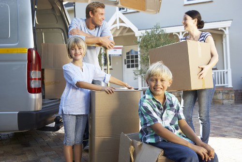 Packed boxes and furniture ready for transport during a West Kensington relocation