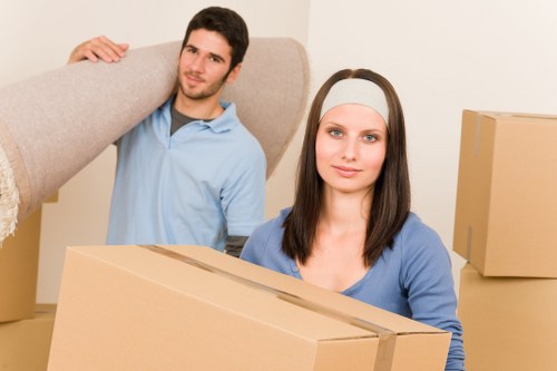Packed boxes and furniture ready for house removals in West Kensington