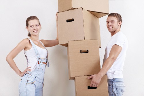 Packed business boxes and office equipment ready for a commercial move